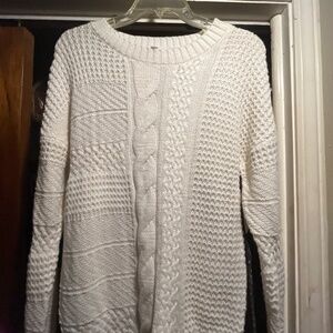 Simple white long sleeve sweater never worn.
